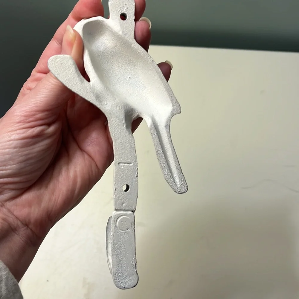 Bird and branch coat hook.